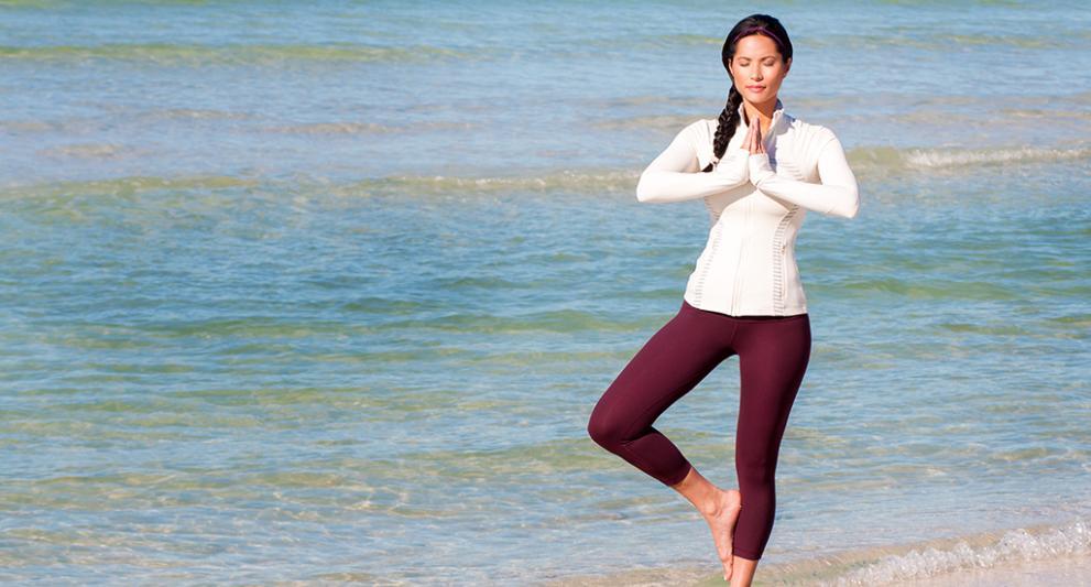 yoga on the beach at sunset in sarasota