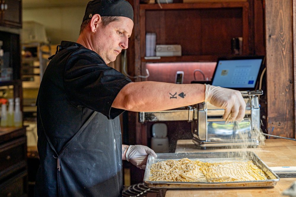 chef making pasta at cafe gabbiano