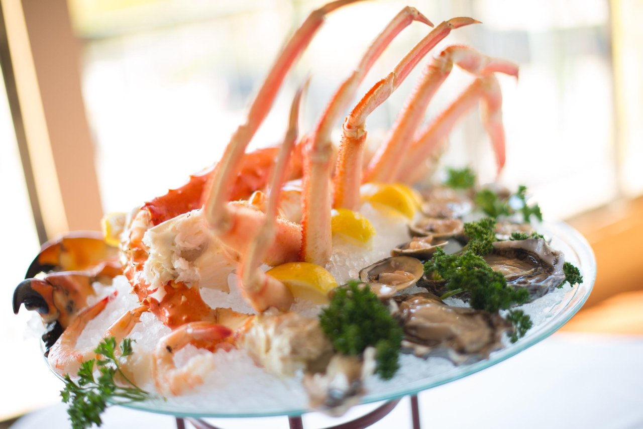 king crab and oysters being served at a sarasota restaurant