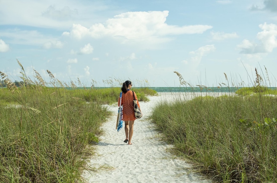 girl walking on lido beach