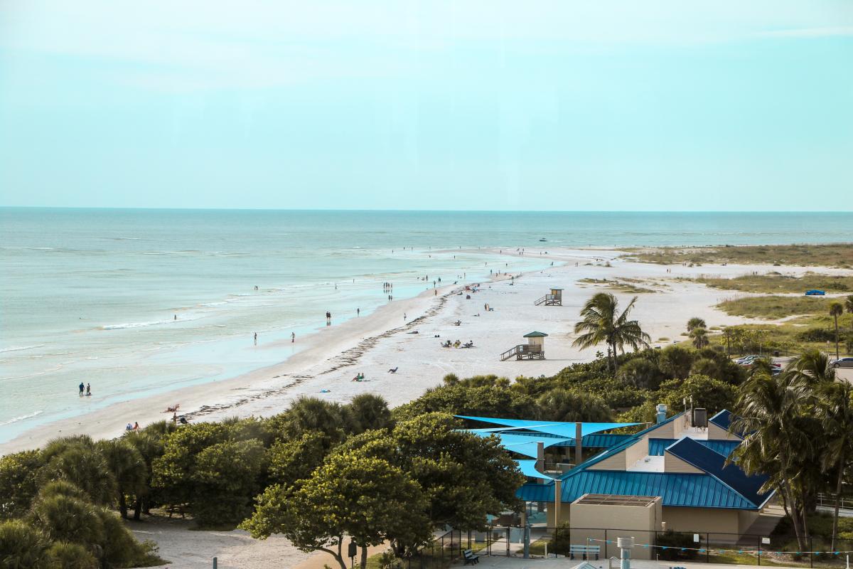 vacationers enjoying a beach day at lido key florida