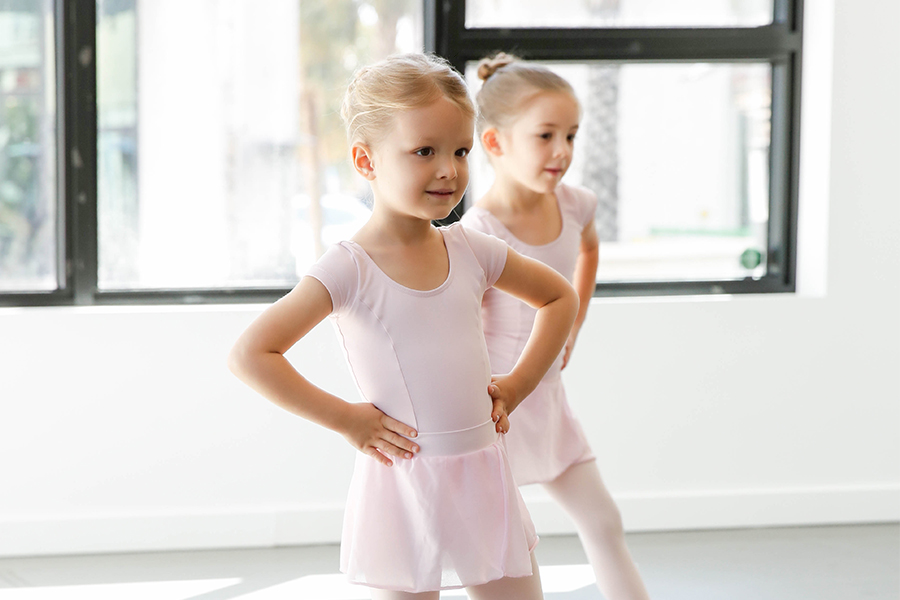 Primary students practice ballet.