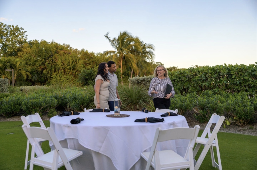 event coordinator showing couple venue at longboat key resort