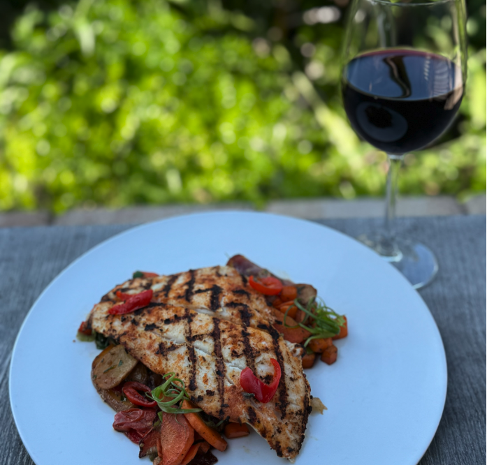 englewood dish and glass of wine