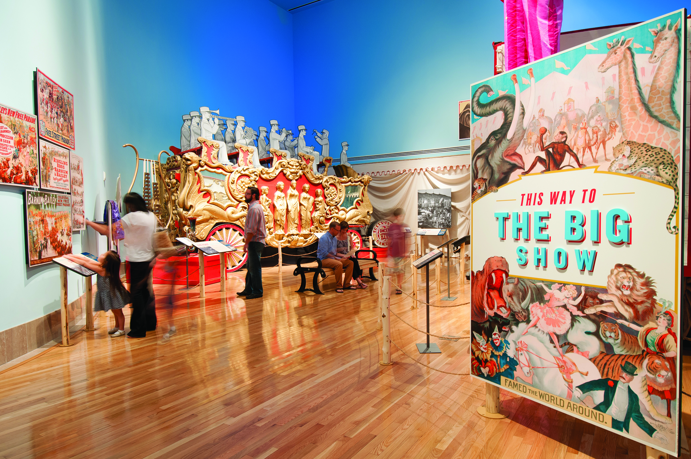 kids looking at circus posters at the ringling