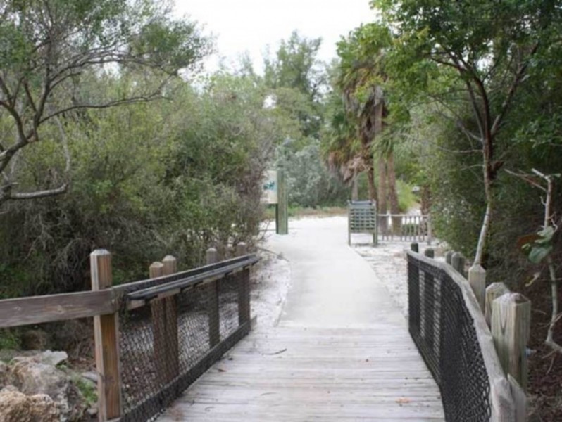 Boardwalk through coastal vegetation at Quick Point Nature Preserve on Longboat Key