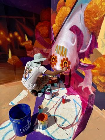artist painting at the sarasota chalk festival