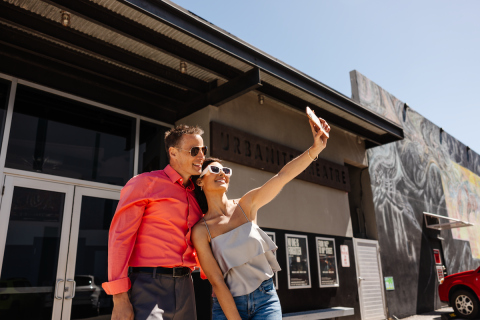 couple outside of urbanite theatre in downtown sarasota