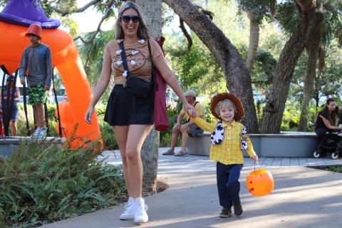 mom and child dressed up for halloween at the bay park