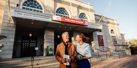 couple outside asolo rep theatre for a show
