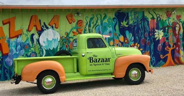 The Bazaar Mobile - Our Bazaar truck looks so good in front of the mural, Gypsy Gardener, one of our vendors painted!