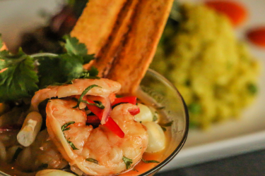 Shrimp appetizers served in a martini glass