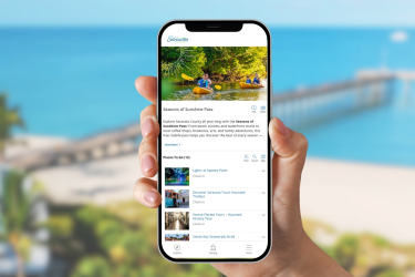 Photo of mobile phone showing Seasons of Sunshine pass