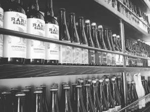 99 Bottles Taproom & Bottle Shop - shelves full of a well-curated selection of exceptional craft beer...