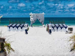 Nautical Tide Wedding Package - Crisp Siesta Key Beach White Sand accented with our traditional Navy & White Sailor Theme!