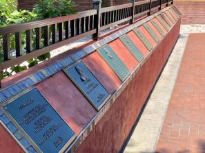 Dedication Wall - Honors:  Fredd “Glossie” Atkins, Delores D. Dry, Carolyn J. Mason, Jerome Stevens, Neil Humphrey, Sr., Dorothye G Smith, Jerome Dupree, Mrs. Janie Jackson Poe, Professor Roland W. Rogers, Booker High School First Graduation Class 1935 - Annie Blue McElroy, Marthena Riley, A.L. Williams and Nacomi Williams; First BHS Principal - Professor James R. Dixon., Emma E. Booker, John Henry Floyd, Wright and Sarah Bush, Joe and Elizabeth Holton, Charlie Jones, Sam Morgan, Shep and Annie Albright, Neil Humphrey, and Charles N. Thompson. Walk along the wall to read about their accomplishments!