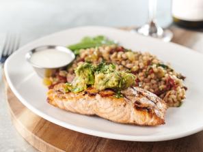 AVOCADO SALMON - Fresh cold water Chilean salmon, avocado salad, citrus crema, snow peas, Mediterranean farro