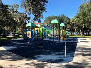 Whitaker Park Playground - The park has a restroom, playground, swing-set, picnic tables, and trails.