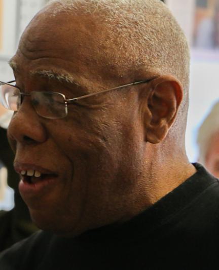 Jetson Grimes speaking to a tour group visiting his Newtown Historical Gallery on Osprey Avenue (Photo: Visit Sarasota County)
