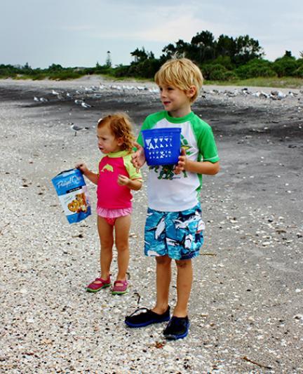 Caspersen Beach, hunting for Sharks' teeth.  Photo credit: Liz Sandburg.