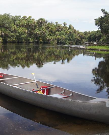 Idle canoes at Snook Haven.  Photo credit: Robin Draper