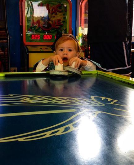 Air hockey fun at Evie's in Sarasota County. Photo by Liz Sandburg