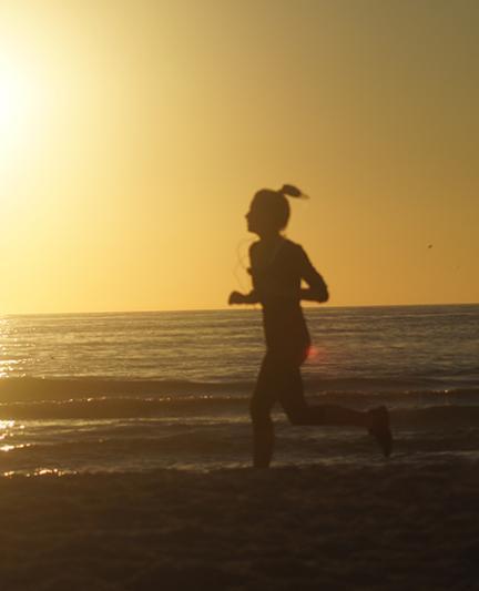 Running On The Beach. Photo credit: Robin Draper.
