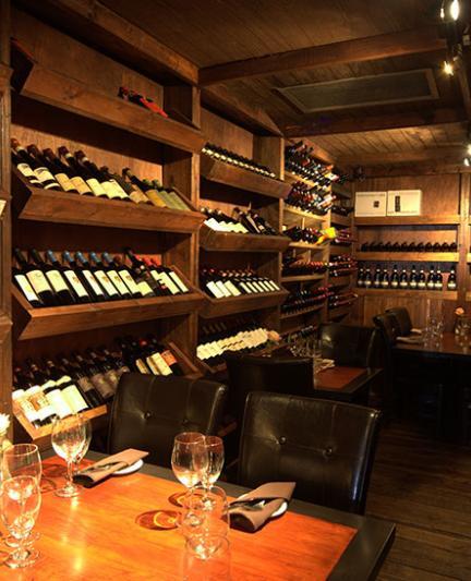 Custom wine cellar and seating at Café Gabbiano