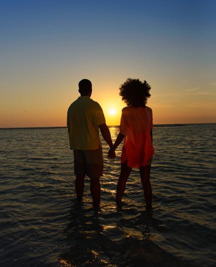 Couple enjoying a Sarasota sunset