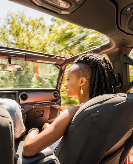 couple driving through state park