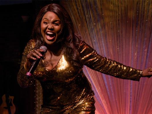 Cast Member Jannie Jones Singing.