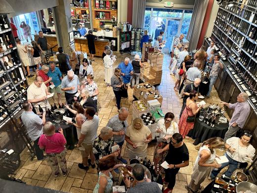 Open House Guests inside Michael's Wine Cellar