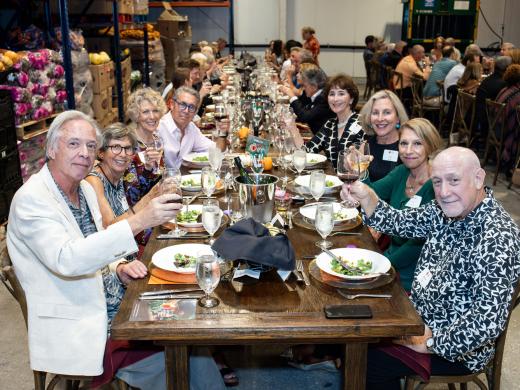 Guests enjoying the 2024 Autumn Harvest Dinner at All Faiths Food Bank