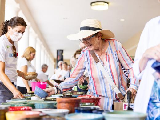During All Faiths Food Bank's Bowls of Hope event, guests choose from beautiful, handcrafted bowls to keep