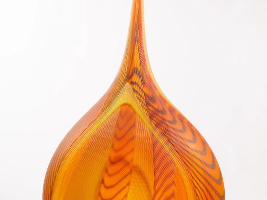 Orange and yellow glass figure 