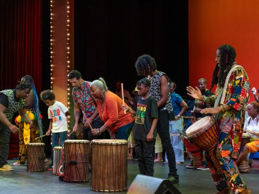 African drumming group Fethiou Thiossane performing during the 2025 Juneteenth Arts Festival