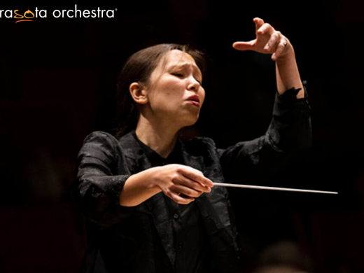 Sarasota Orchestra conductor holding baton