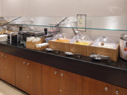 Complimentary Hot Breakfast Buffet - Lots of hot choices on the buffet, toaster items, make your own waffles, yogurt and more. Photo 3