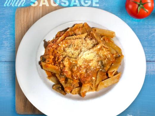 Trenne Dolce Italia - Our signature specialty- triangle pasta with creamy tomato sauce, mozzarella, tomatoes, mushrooms, and parmigiano. Can add sausage or meatballs. Photo