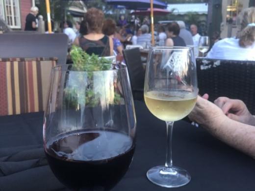 Wine in the courtyard - Enjoy a glass of wine while enjoying beautiful Sarasota weather on our open-air couryard Photo 2