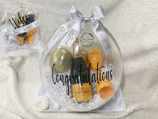 Pop-It A Gift - Our stuffed latex balloon (18" balloon). Customized and Personalized for your occasion. Any flexible items that we can insert in the balloon. Existing inventory items, personal shop... Photo 7