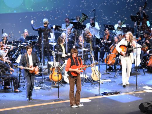 The Beatles Tribute Show with Bubbles - Visiting Beatles tribute artists bring great fun with classic songs you know and love - which is what The Pops Orchestra does best. Photo 5