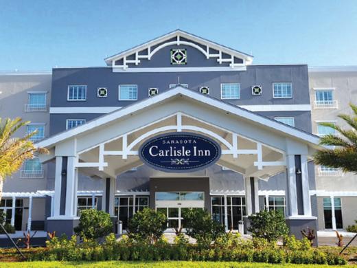 Carlisle Inn Sarasota - A lovely 100-room hotel located in the Pinecraft community, the heart of Sarasota's Amish settlement. Stay in peace and comfort, just minutes away from Sarasota's top-ranked... Photo
