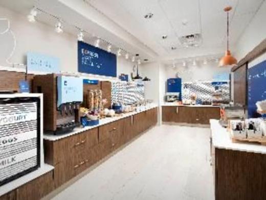 Holiday Inn Express Breakfast - Complimentary hot breakfast buffet features hot cinnamon rolls, eggs, protein, pancakes, oatmeal, cereal, yogurt, hard boiled eggs, muffins, coffee, juice and more! Photo 4