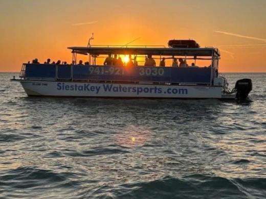Sunset Cruise / Dolphin Tour - Guests enjoy a breathtaking sunset dolphin tour along the waters of Siesta Key and Sarasota Bay. As the sun sets over the Gulf Coast, passengers often spot dolphins, ... Photo 5
