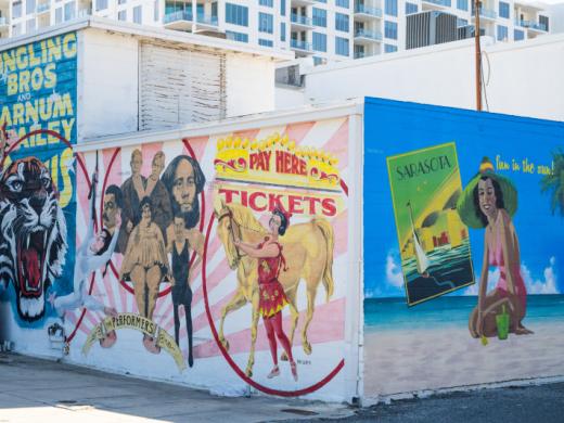 "The Performers" and "Fun in the Sun" by David Lee - The Performers 
The legacy of the circus arts in Sarasota is brought to the fore in David Lee’s mural, The Performers. Lee brings the Main Str... Photo 5