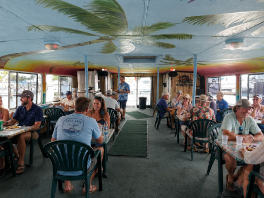 LeBarge Passengers - Passengers relax and enjoy the atmosphere aboard LeBarge Tropical Cruises on Sarasota Bay. Photo 3
