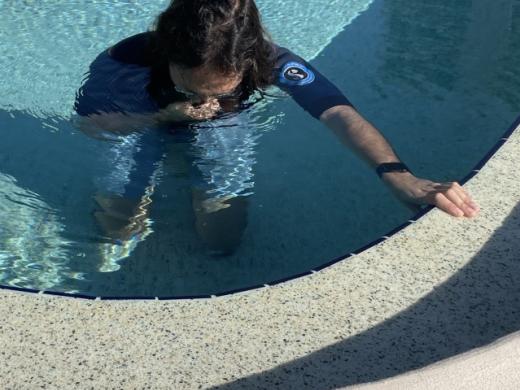 Day 1: Hand on nose, other hand on wall - Normal start: doesn't love face in water Photo