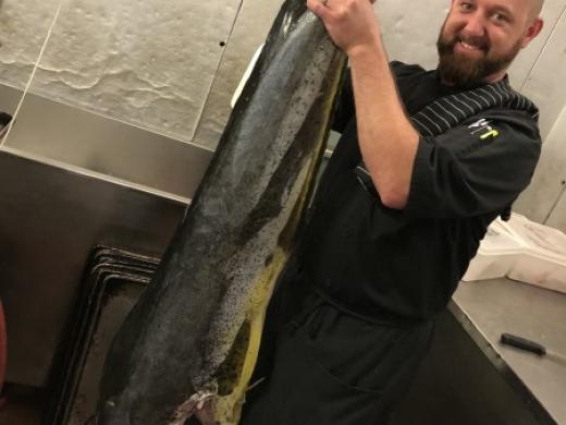 Chef Troy & Gulf Mahi Mahi - Chef Troy holding a Gulf Mahi Mahi Photo 4