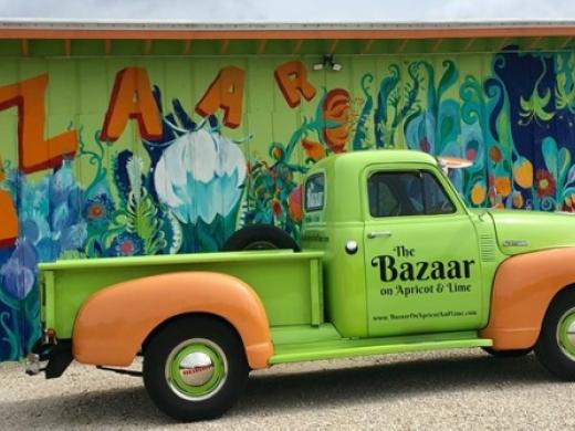 The Bazaar Mobile - Our Bazaar truck looks so good in front of the mural, Gypsy Gardener, one of our vendors painted! Photo 4